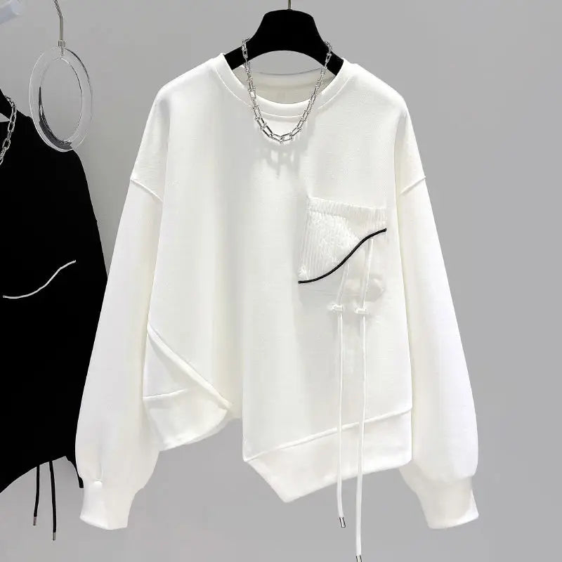 Damen Sweatshirt mit Rundhalsausschnitt, asymmetrischem Saum und dekorativer Tasche