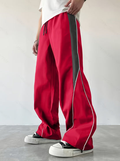 Herren Streetwear Weite Jogginghose mit Kontraststreifen und sportlichem Look