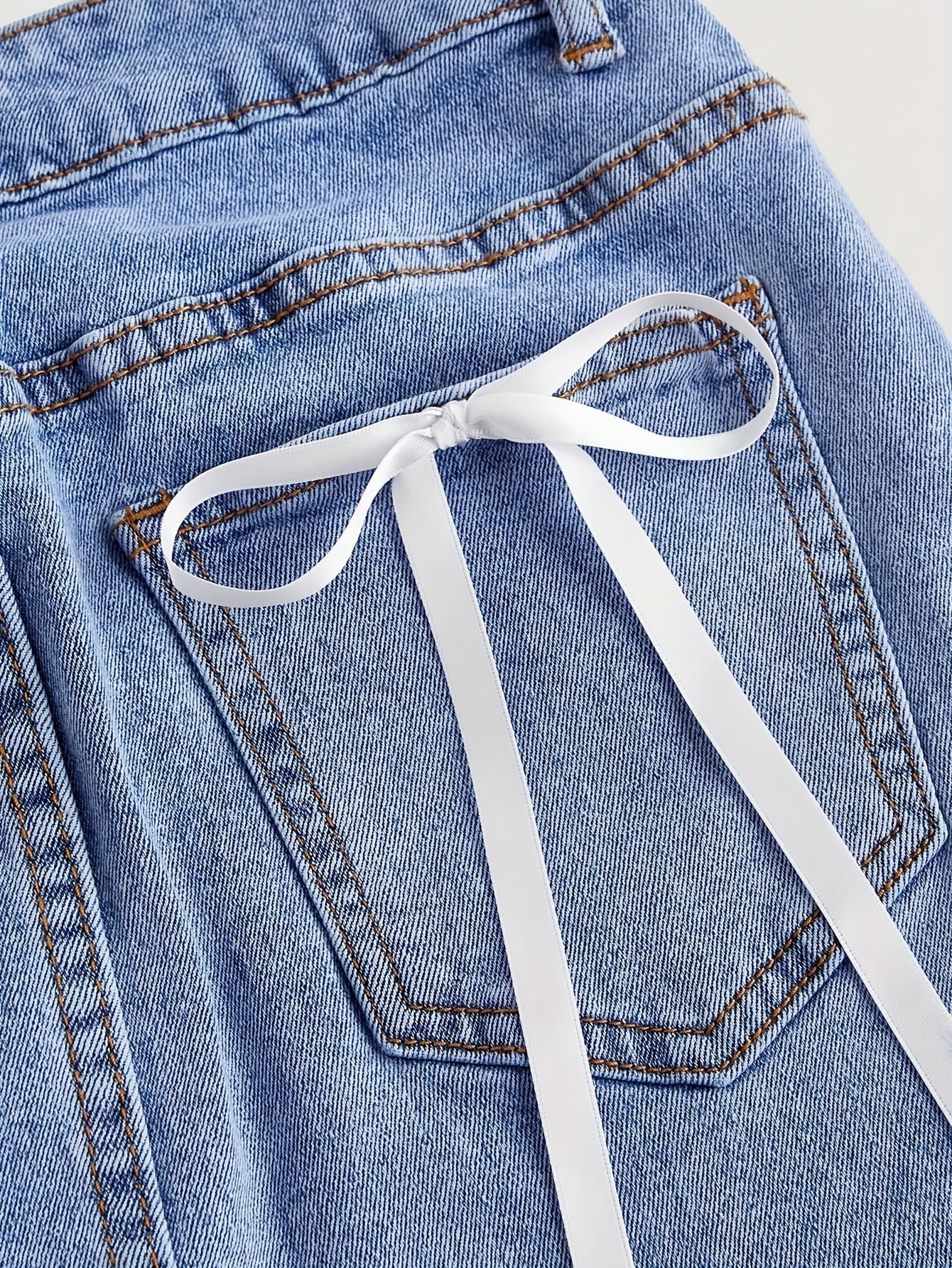 Damen Jeans Minirock im eleganten Stil mit verspielten Schleifen und Taschen – Perfekt für Freizeit und Sommer