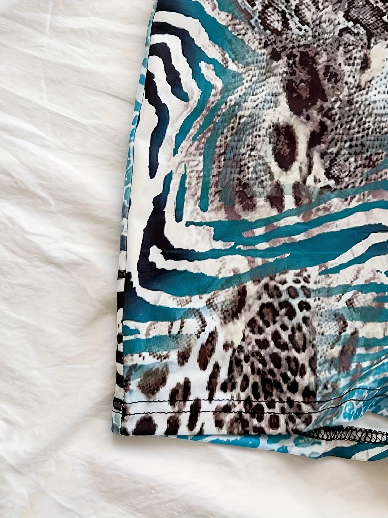 Damen Jumpsuit mit tiefem Ausschnitt und Animal-Print – Modischer Einteiler für Strand, Urlaub & Sommerpartys