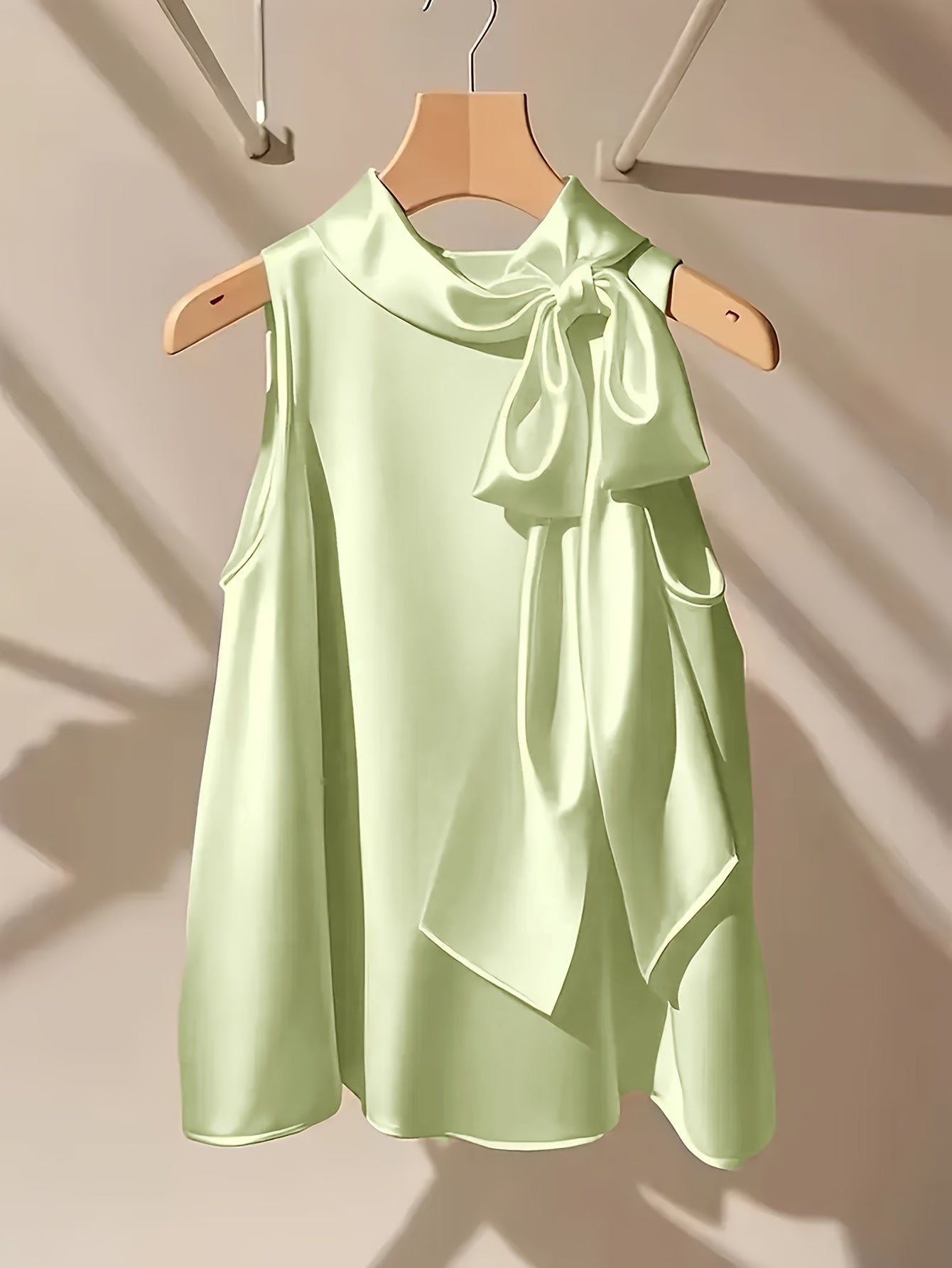 Damen Elegantes ärmelloses Oberteil mit Schleifendetail für festliche Anlässe