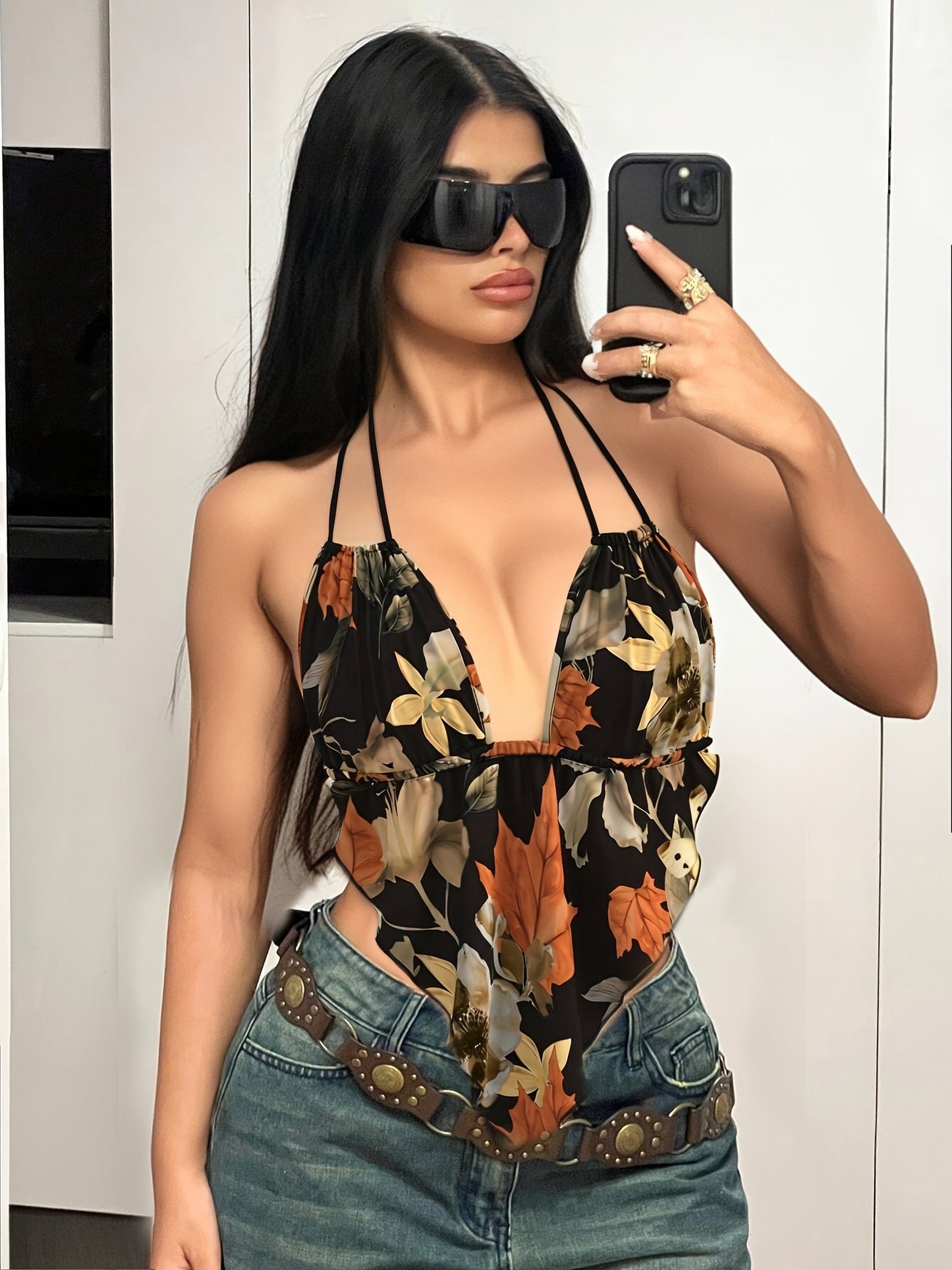 Damen Body mit Blumenmuster und tiefem Ausschnitt – Modischer Einteiler für trendige Freizeit-Looks