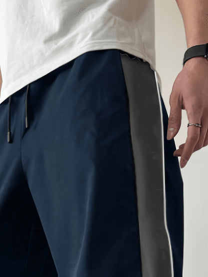 Herren Streetwear Weite Jogginghose mit Kontraststreifen und sportlichem Look