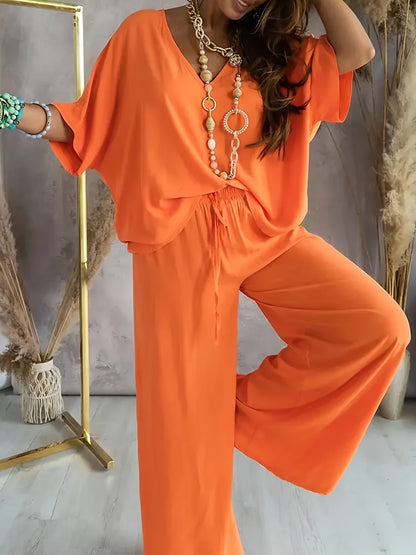 Damen Eleganter Jumpsuit mit weitem Bein und V-Ausschnitt – Perfekt für Freizeit und Partys