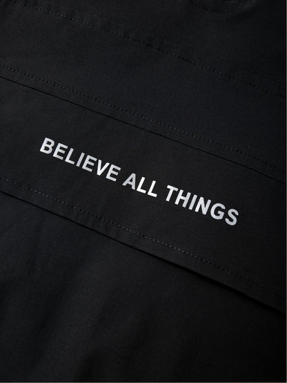 Schwarze Kapuzenjacke mit Halbreißverschluss und Bauchtasche