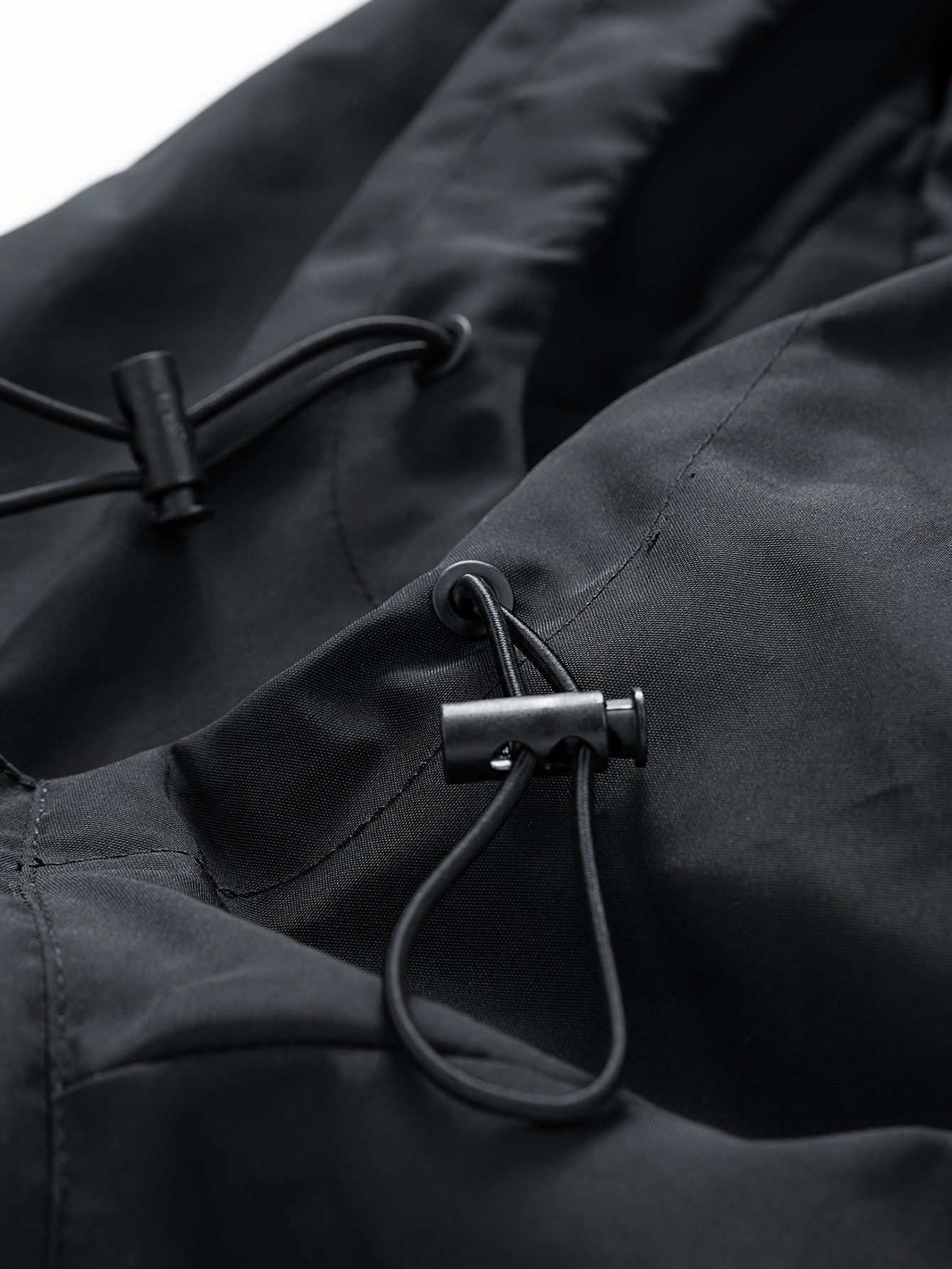 Unisex Windjacke Schwarz mit Kapuze & rotem Drachenmotiv