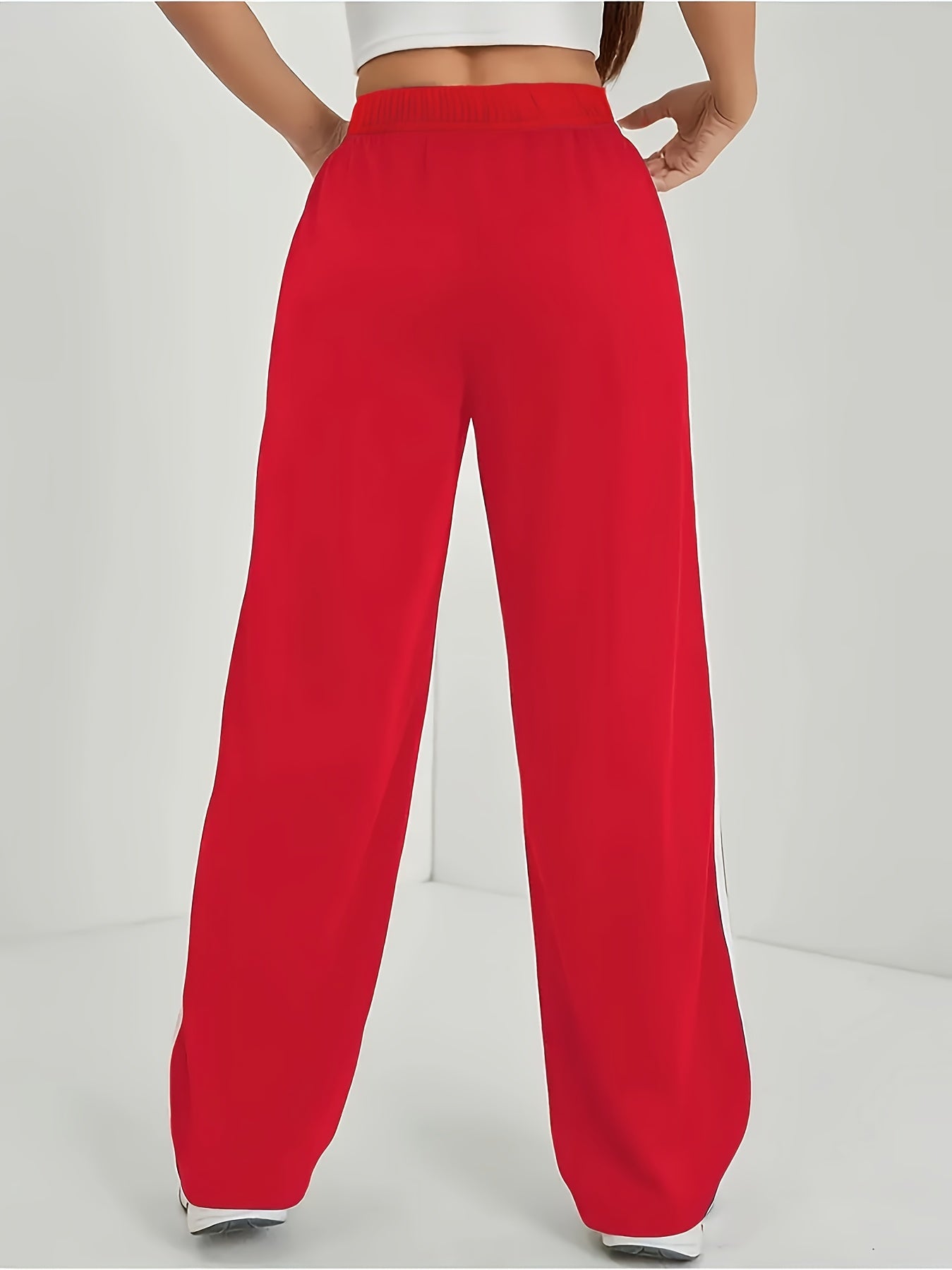 Damen Weite Sporthose mit Streifen und Retro-Look