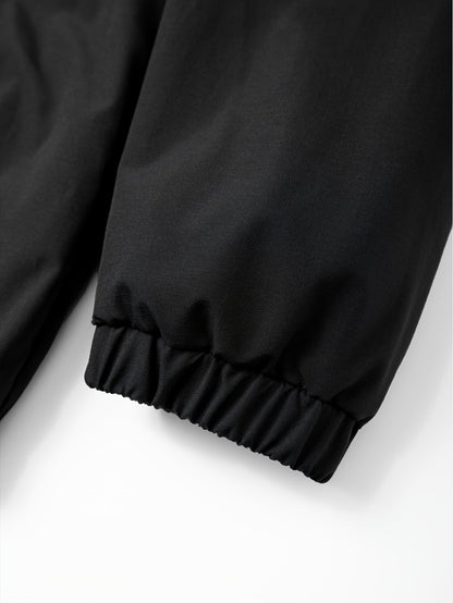 Schwarze Kapuzenjacke mit Halbreißverschluss und Bauchtasche