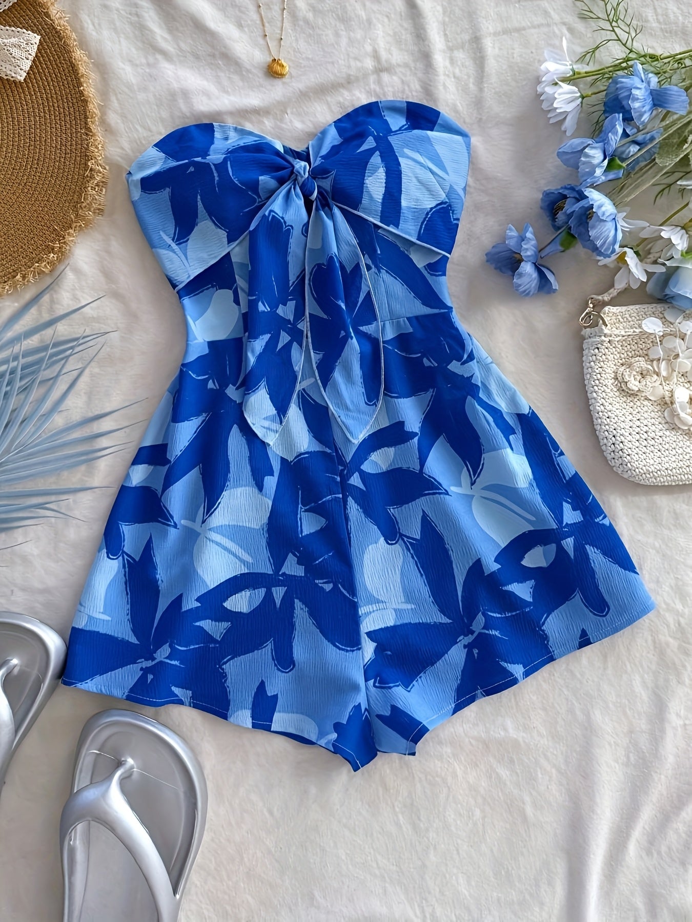 Damen Bandeau Jumpsuit mit Blumenmuster und Schleifendetail – Sommerlicher Einteiler für Urlaub und Freizeit