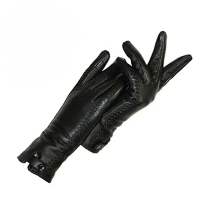 Schwarze Handschuhe aus weichem Material mit Knopfdetails und sichtbaren Nähten