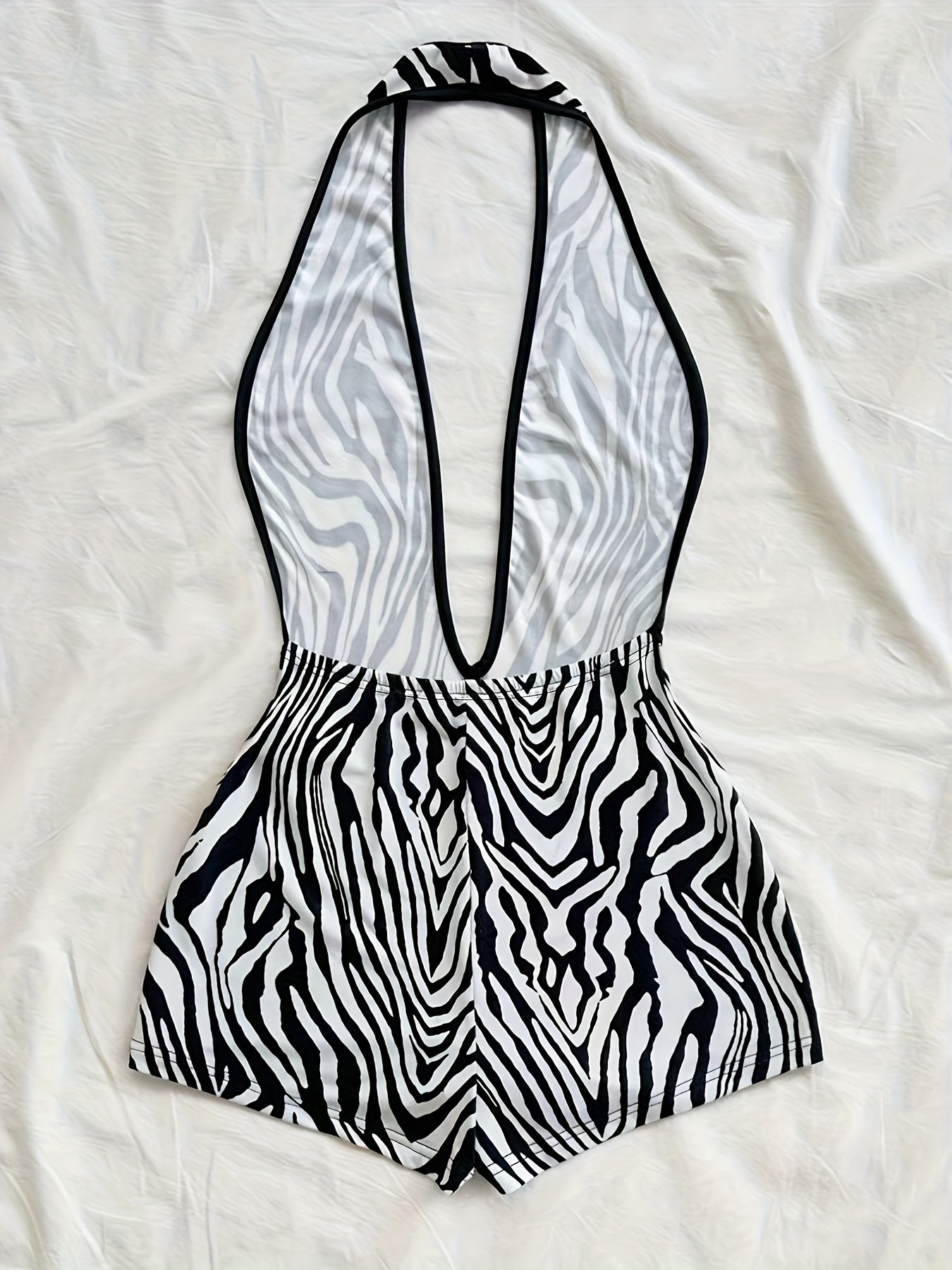 Damen Jumpsuit mit tiefem Ausschnitt und Animal-Print – Modischer Einteiler für Strand, Urlaub & Sommerpartys
