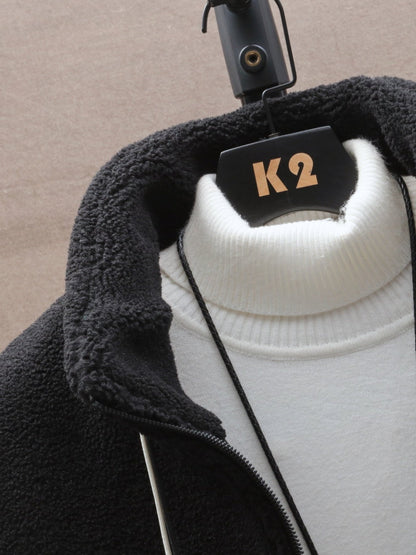 Unisex Teddyfleece Jacke mit Stehkragen und Schachbrettmuster
