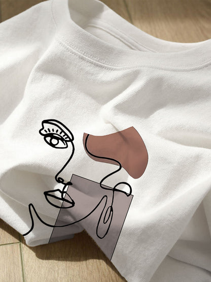 Damen T-Shirt mit abstraktem Gesicht Print – Modernes Kunst Design, Freizeitstil, ideal für Alltag und Streetwear