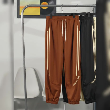 Herren Streetwear Jogginghose mit weitem Bein und Streifen – Urban Style Freizeit Trainingshose