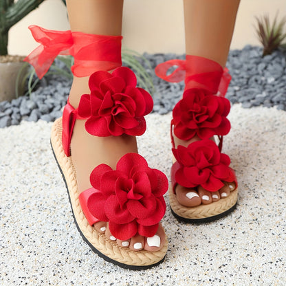 Damen Sandalen mit Blumenverzierung und Schleifen – Verspielte Sommerschuhe im femininen Stil