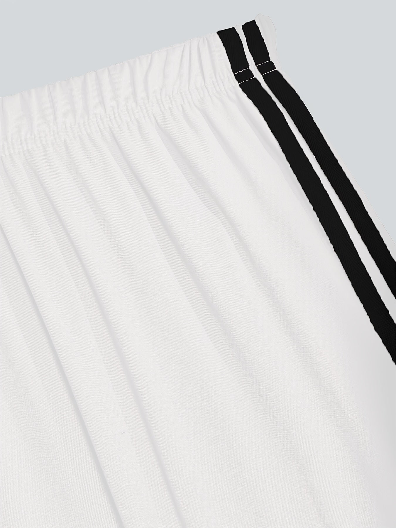 Damen Weite Sporthose mit Streifen und Retro-Look
