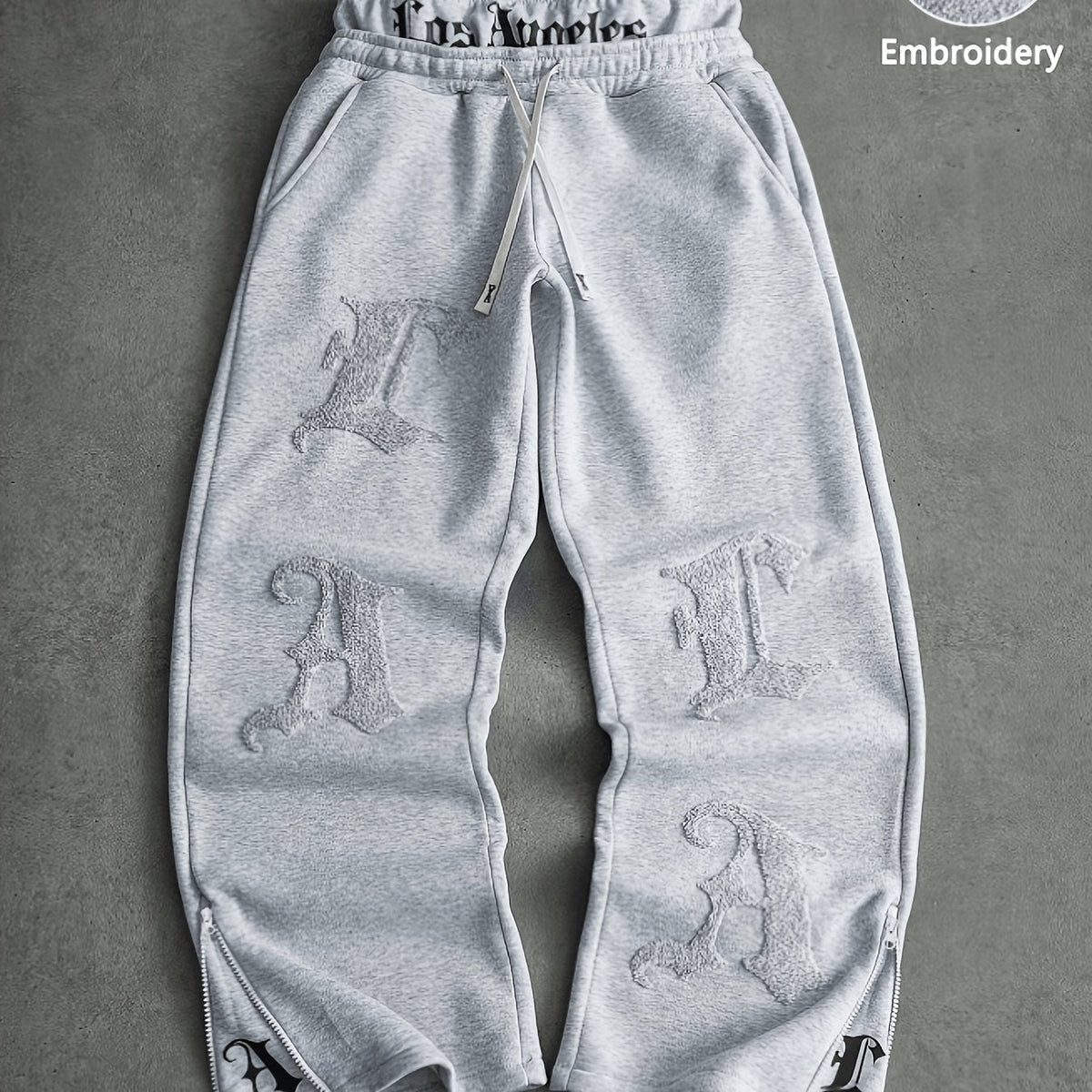 Jogginghose Unisex mit Stickerei „Los Angeles“ und Reißverschlüssen an den Knöcheln
