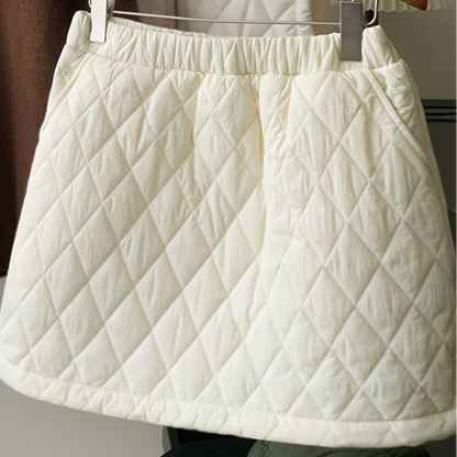 Gesteppter Minirock mit Gummibund in Beige