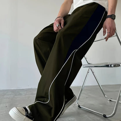 Herren Streetwear Weite Jogginghose mit Kontraststreifen und sportlichem Look
