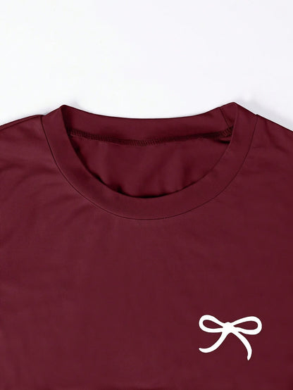 Damen T-Shirt mit Schleifenstickerei und Raffungen – Modisches Kurzarmshirt für Freizeit und Alltag