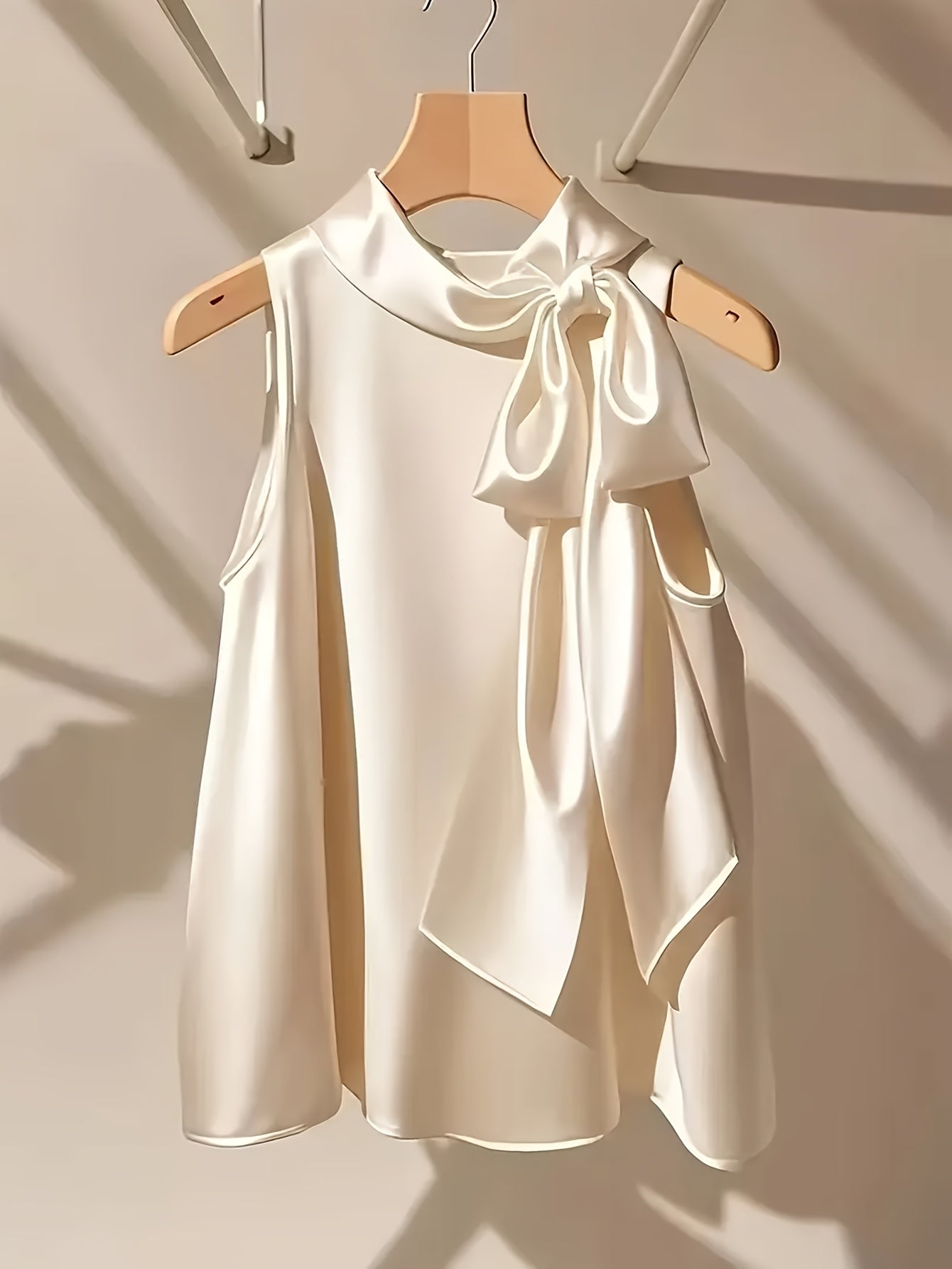 Damen Elegantes ärmelloses Oberteil mit Schleifendetail für festliche Anlässe