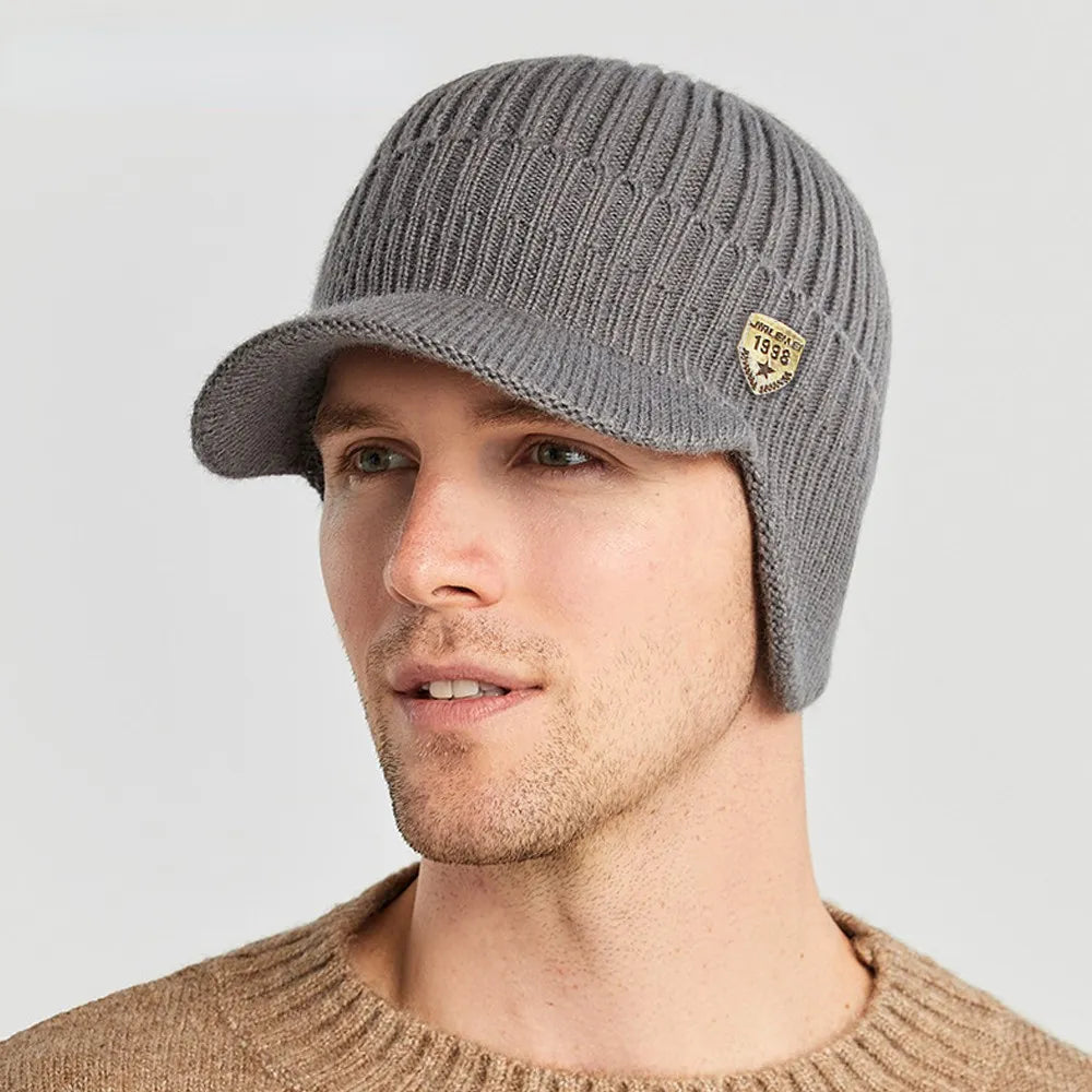 Strickmütze mit Schirm und Ohrenklappen Herren Wintermütze gerippt