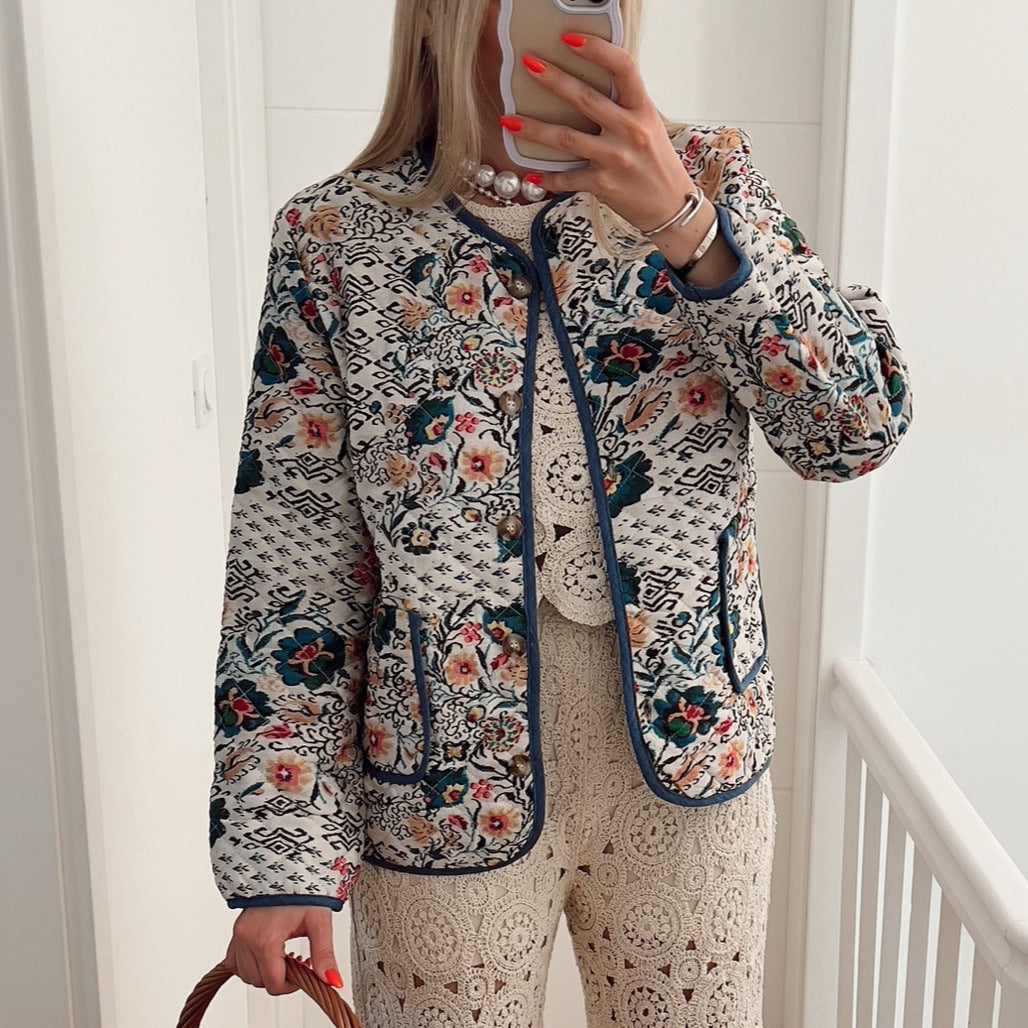 Damen Steppjacke im Blumenmuster mit Kontrastbesatz
