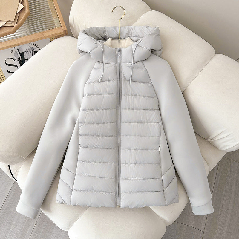 Damen Steppjacke mit Kapuze und Ärmeln aus weichem Material