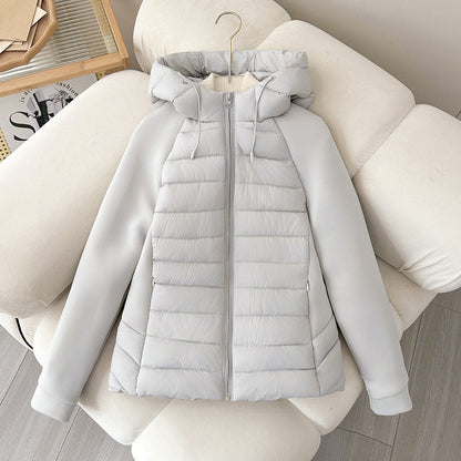 Damen Steppjacke mit Kapuze und Ärmeln aus weichem Material