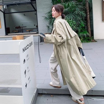 Damen langer Trenchcoat beigefarben mit Stehkragen und Kordelzug