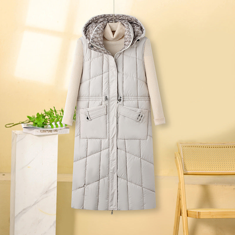 Damen Steppweste lang mit Kapuze | Gesteppte ärmellose Jacke für Damen