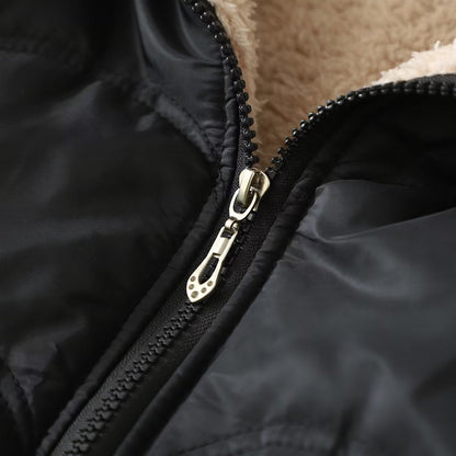 Damen Steppjacke Schwarz mit Kapuze und Futter aus weichem Material