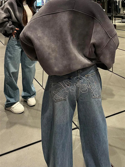 Damen Jeans Weites Bein Hellblau mit Strass Schriftzug auf Gesäßtaschen