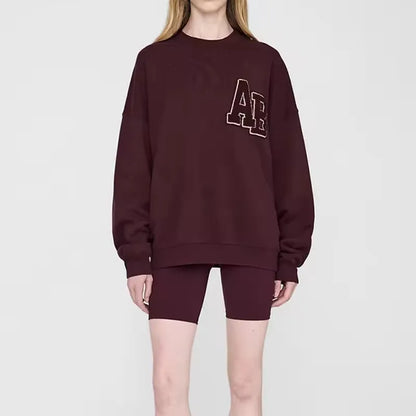 Damen Oversize Sweatshirt Rundhals Grau mit „PARIS“-Schriftzug