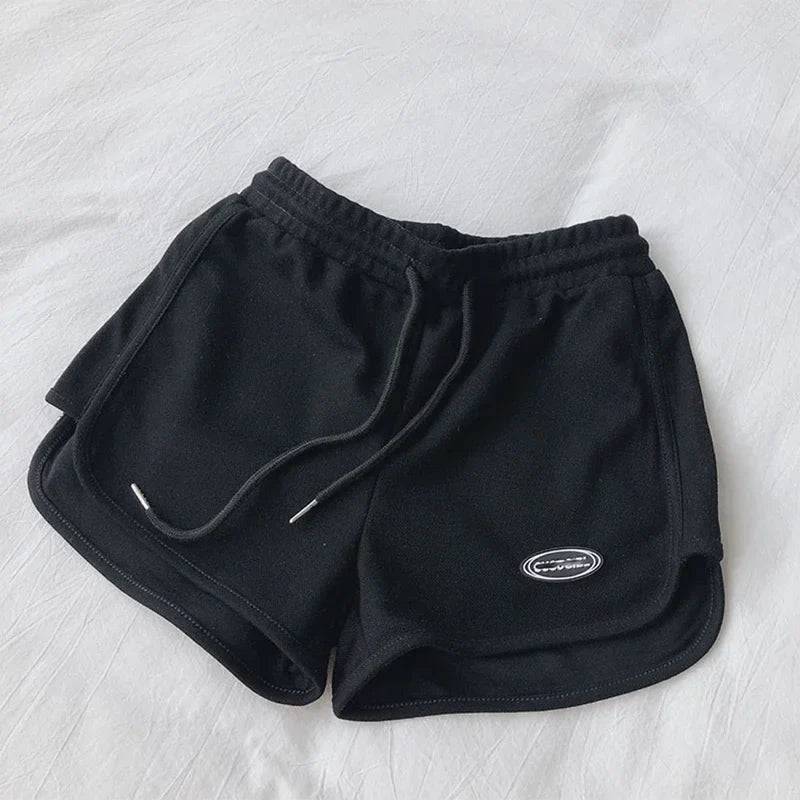 Damen Sportshorts mit Kordelzug und Logo-Patch
