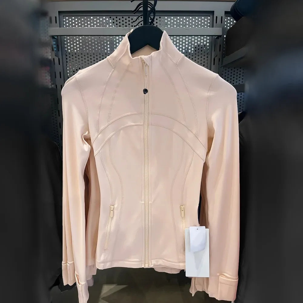 Damen Sportjacke mit Stehkragen, Reißverschluss und Daumenlöchern – Grau