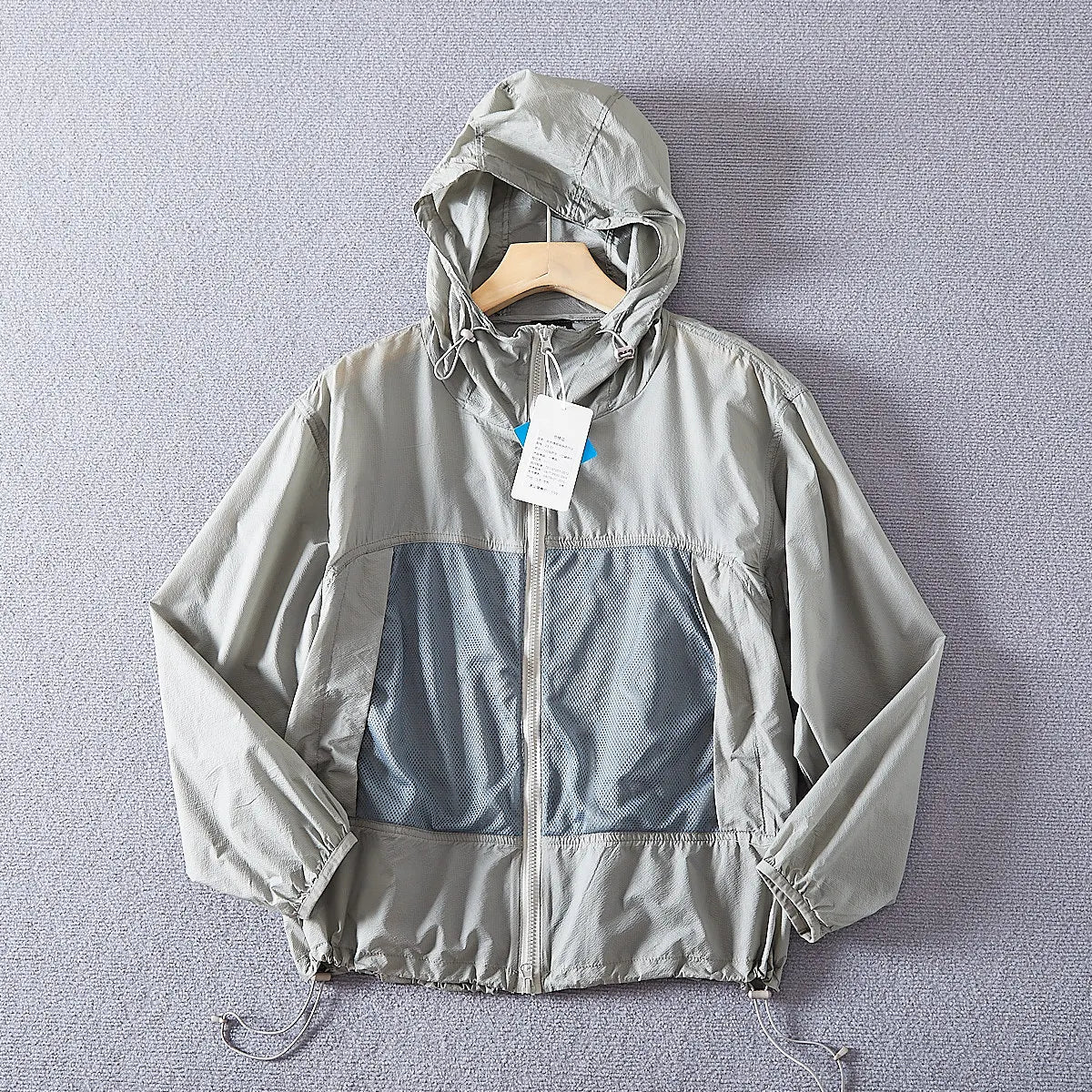 Leichte Kapuzenjacke Unisex mit Reißverschluss und Netzeinsätzen, Windbreaker
