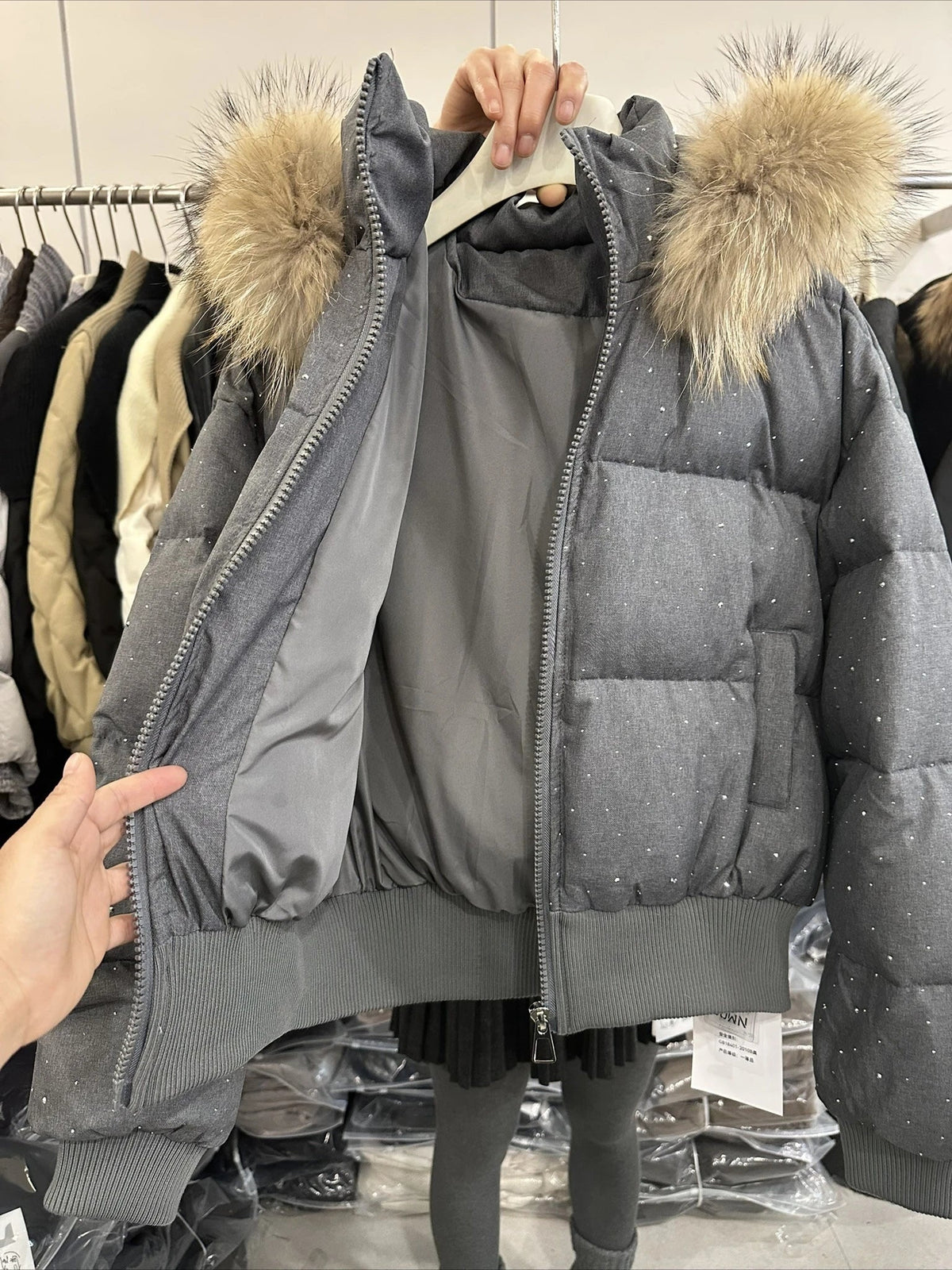 Damen Steppjacke mit Fellkapuze Glitzer-Details Winterjacke