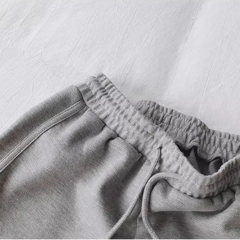 Damen Sportshorts mit Kordelzug und Logo-Patch