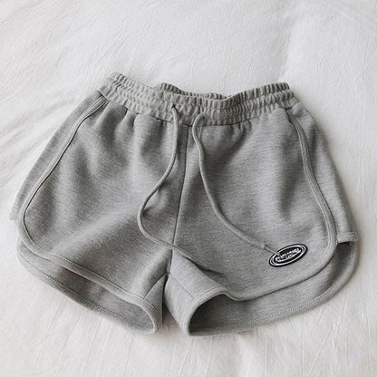 Damen Sportshorts mit Kordelzug und Logo-Patch