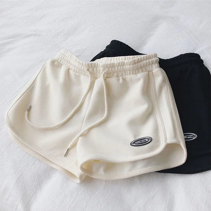 Damen Sportshorts mit Kordelzug und Logo-Patch