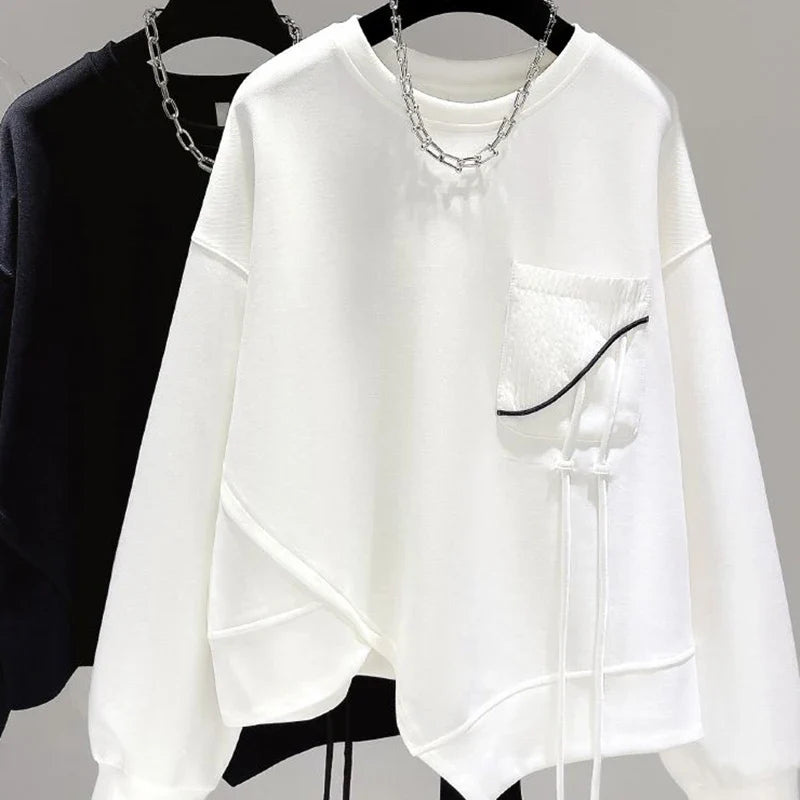 Damen Sweatshirt mit Rundhalsausschnitt, asymmetrischem Saum und dekorativer Tasche