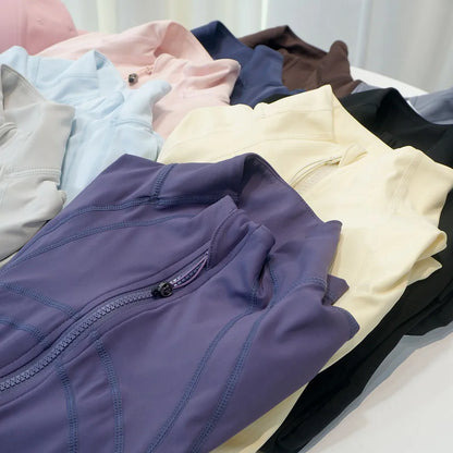 Damen Sportjacke mit Stehkragen, Reißverschluss und Daumenlöchern – Grau