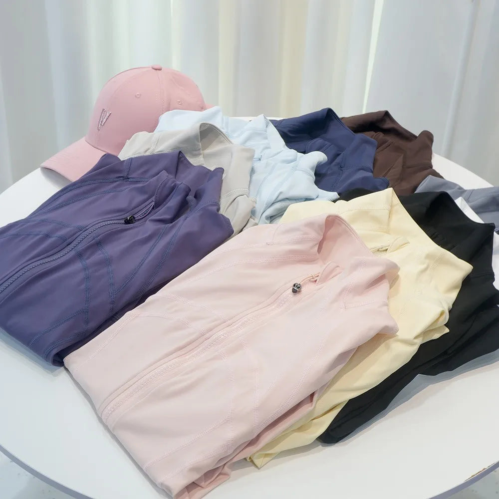 Damen Sportjacke mit Stehkragen, Reißverschluss und Daumenlöchern – Grau
