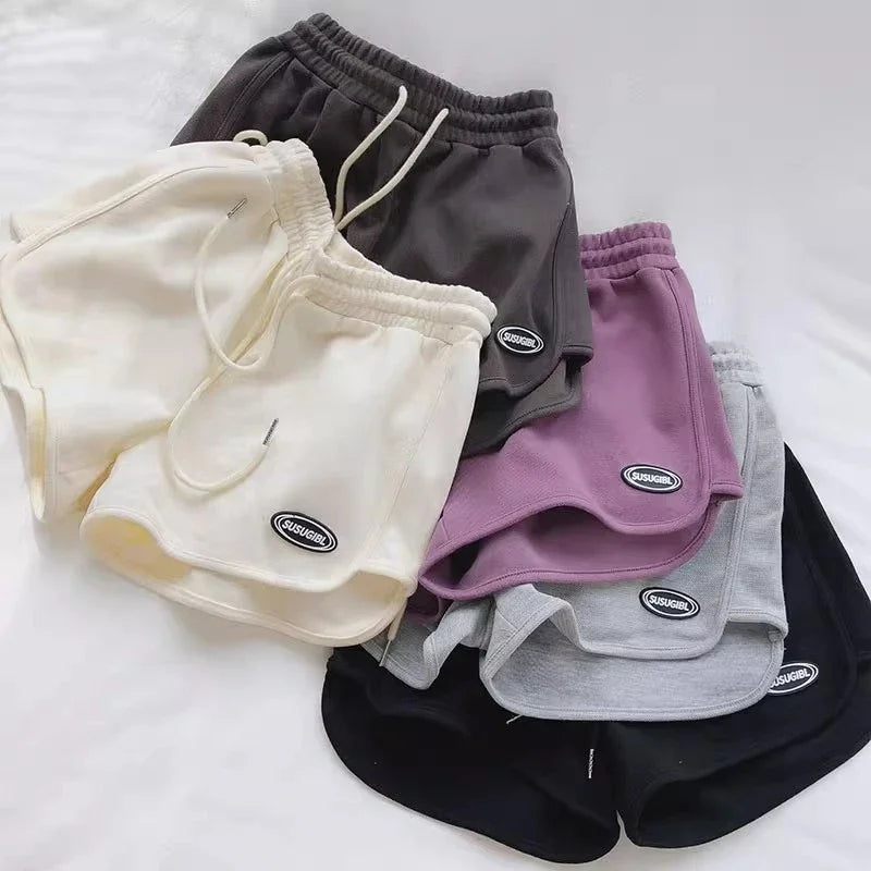 Damen Sportshorts mit Kordelzug und Logo-Patch
