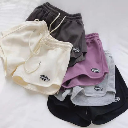 Damen Sportshorts mit Kordelzug und Logo-Patch