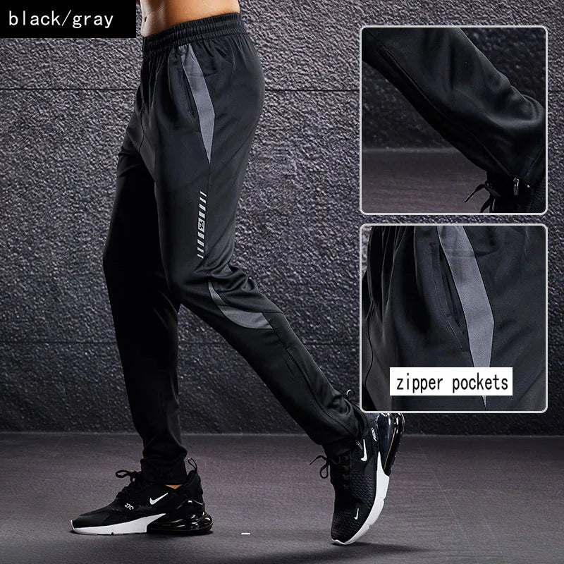 Herren Sport Trainingshose Schwarz mit Farbstreifen Jogginghose Elastischer Bund Reißverschlusstaschen