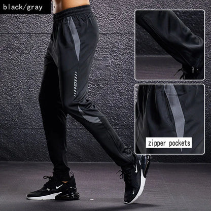 Herren Sport Trainingshose Schwarz mit Farbstreifen Jogginghose Elastischer Bund Reißverschlusstaschen