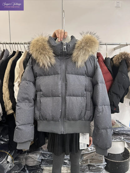 Damen Steppjacke mit Fellkapuze Glitzer-Details Winterjacke
