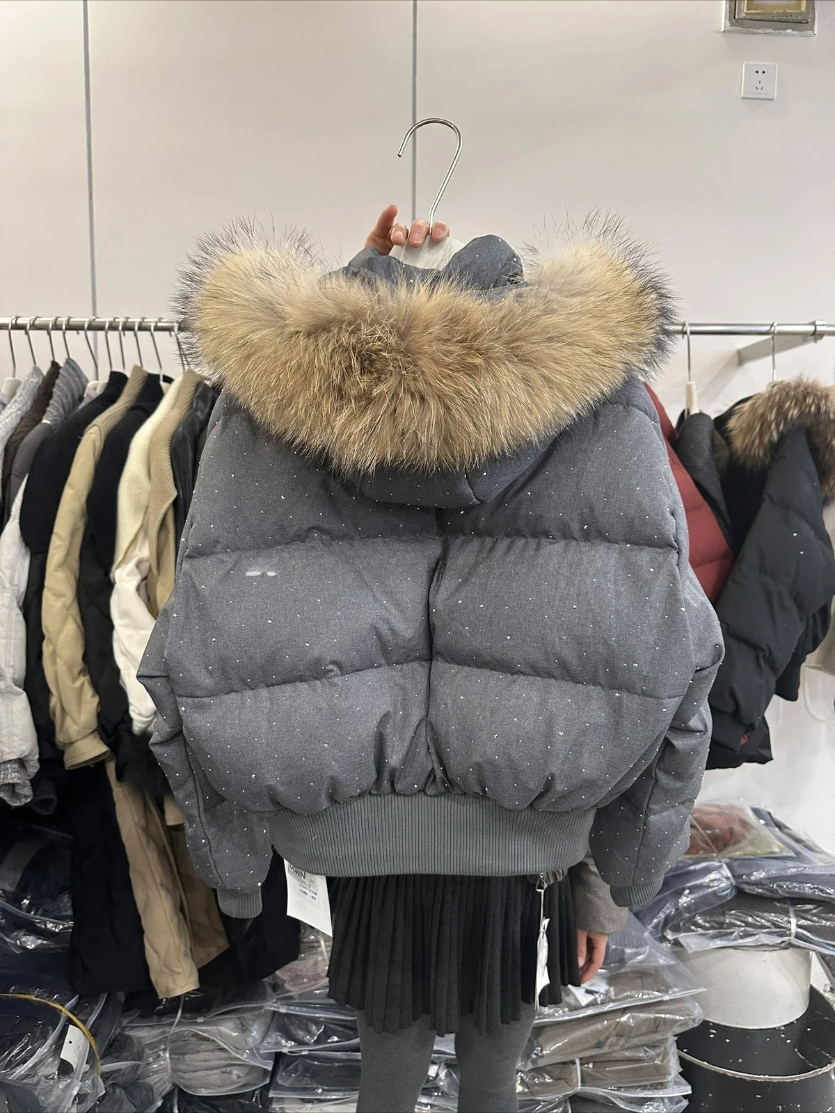 Damen Steppjacke mit Fellkapuze Glitzer-Details Winterjacke